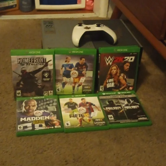 I am selling two Xboxes, six games and a controller